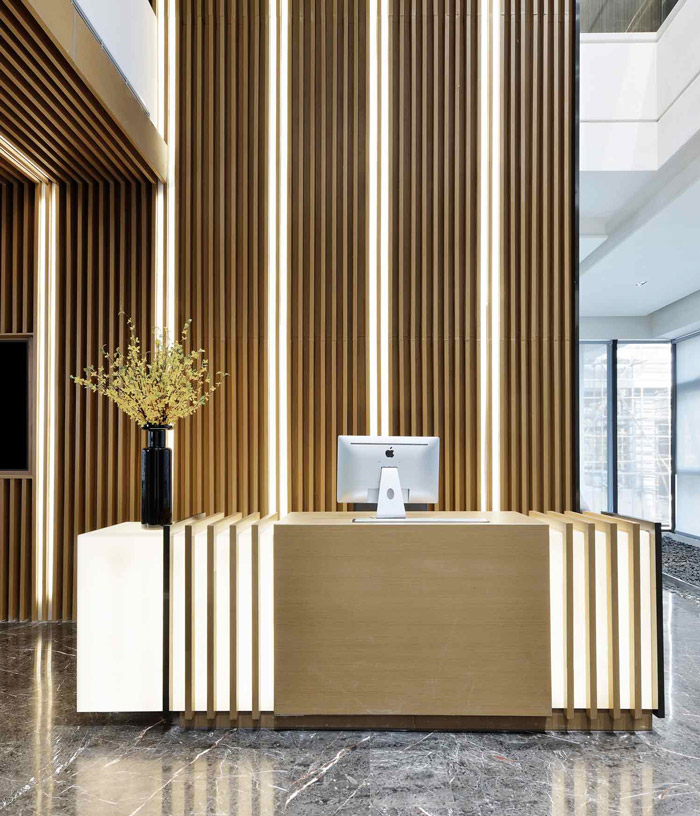 綠色辦公室前臺裝修設(shè)計(jì)效果圖